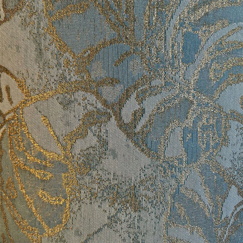 A verdigris green and gold leaf patterned, Jacquard brushed cotton lampshade fabric