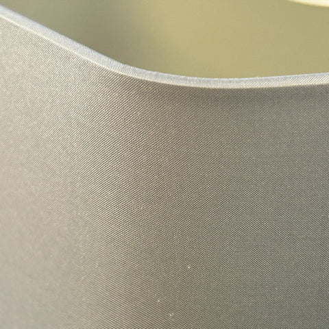 A close up view of the Hexagon Grey Silk Lampshade by Iberian Lighting