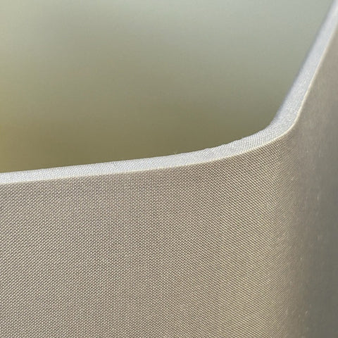 A close up view of the Hexagon Grey Silk Lampshade by Iberian Lighting