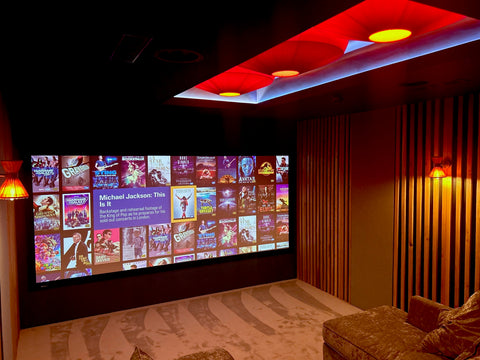 Red Ribbon Cooden Ceiling Lamps and Silk Ringmer Wall Lights designed by Iberian Lighting for a Home Cinema