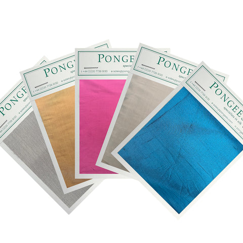 Silk swatch cards from Pongees laid out
