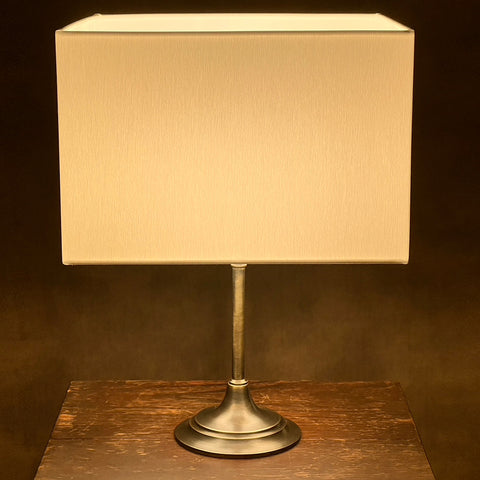 A Lit Square Table Lamp by Iberian Lighting