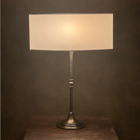 The Eye Tapered Oval Table Lampshade by Iberian Lighting.