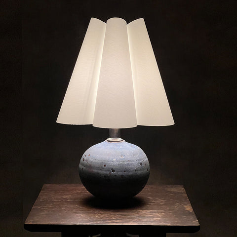 The Wavy-Coolie-Lampshade by Iberian Lighting and lamp base from Ashdown Pottery