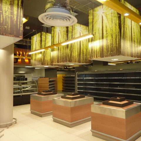 Acrylic Cube Pendant Lampshades with printed forest scene for Centre Parcs. Made by Iberian Lighting
