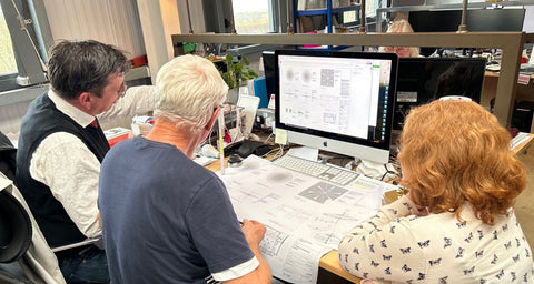 The Iberian Lighting Design Team, Tom Acciarini, Les Allitt and Sue Page, brainstorming over the design manufacturing process of the Oversized Canopy Lampshades for The Georgian Restaurant at Harrods