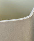 A close up view of the Hexagon Grey Silk Lampshade by Iberian Lighting