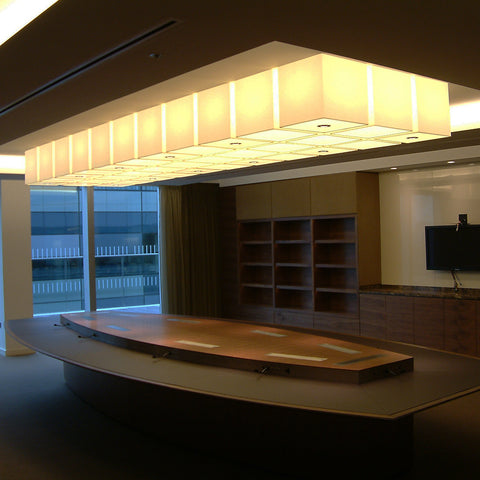 Large meeting table light made of several cubes for Riverbank