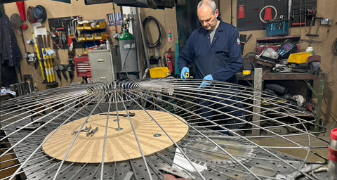 Master Frame Maker, Dave Pain working on a prototype frame for the oversized canopy lampshades for The Georgian Restaurant at Harrods