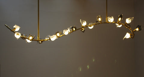 A Twisted Spine Glass Flowers Pendant Light designed by Helen Green and made by Iberian Lighting for Vienna-Villa