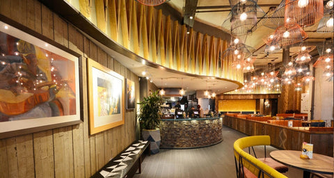 Restaurant View of the Mix and match cage frames for Nando's restaurant made by Iberian lighting