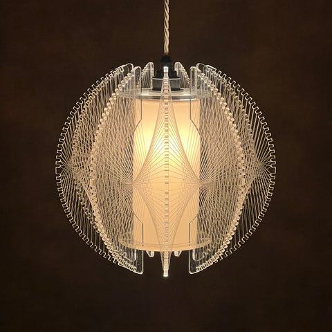 The Winchelsea Lampshade is made from clear acrylic and monofilament nylon string woven in a complex, web-like pattern.